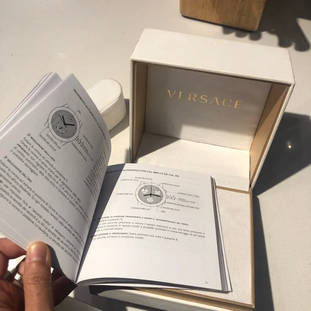 Versace White Dial Watch with Gold Bezel and Brown Strap